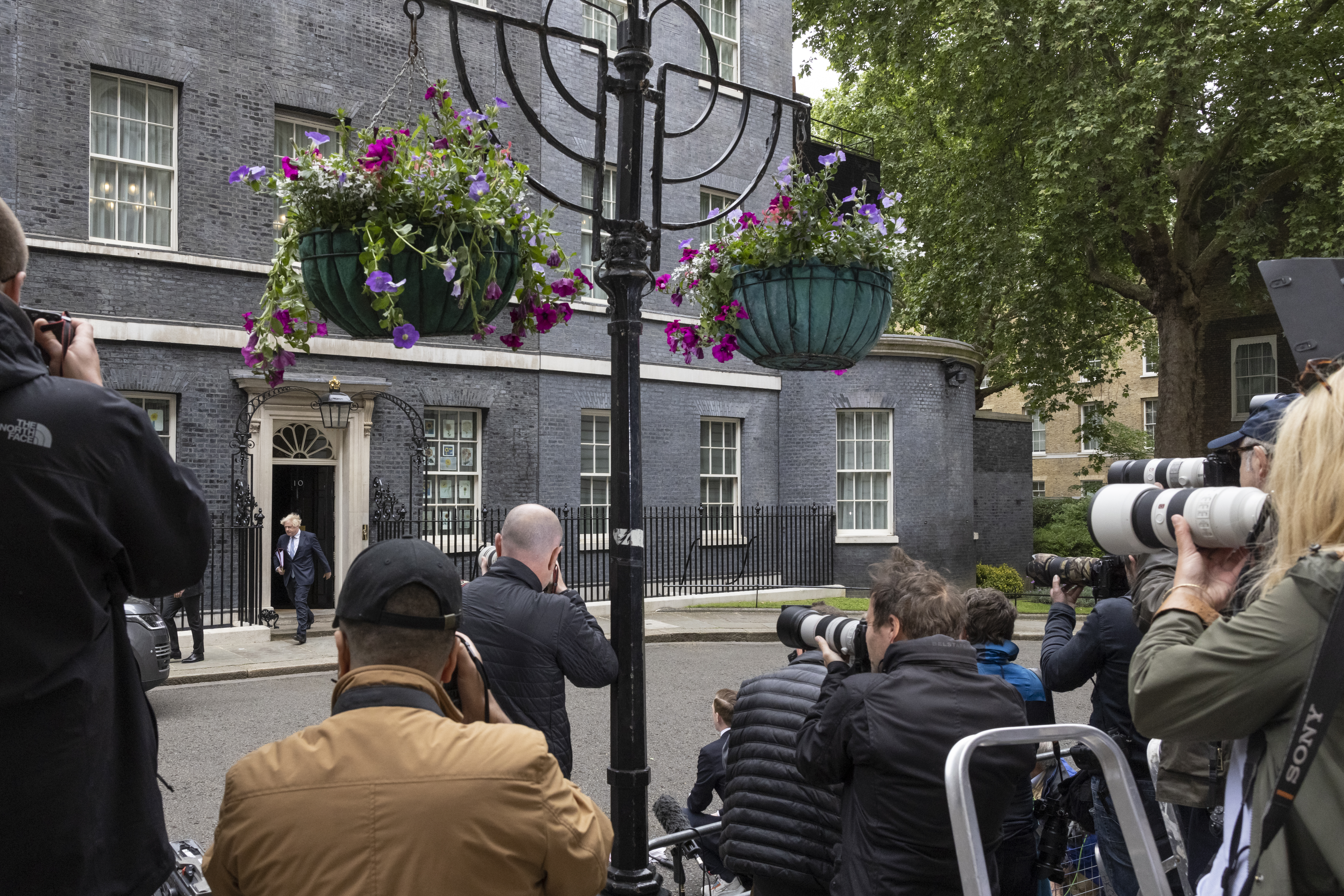 UK Prime Minister Boris Johnson departs 10 Downing Street for PMQs on May 25, 2022 in London, England. 