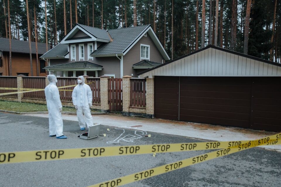 Photo by cottonbro studio: https://www.pexels.com/photo/forensics-investigators-discussing-evidence-at-a-crime-scene-10481268/